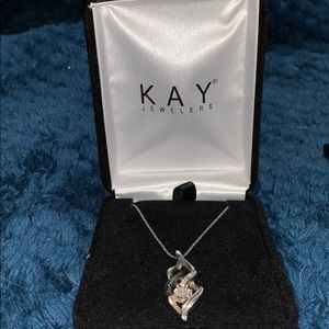 Black and white diamond pendant